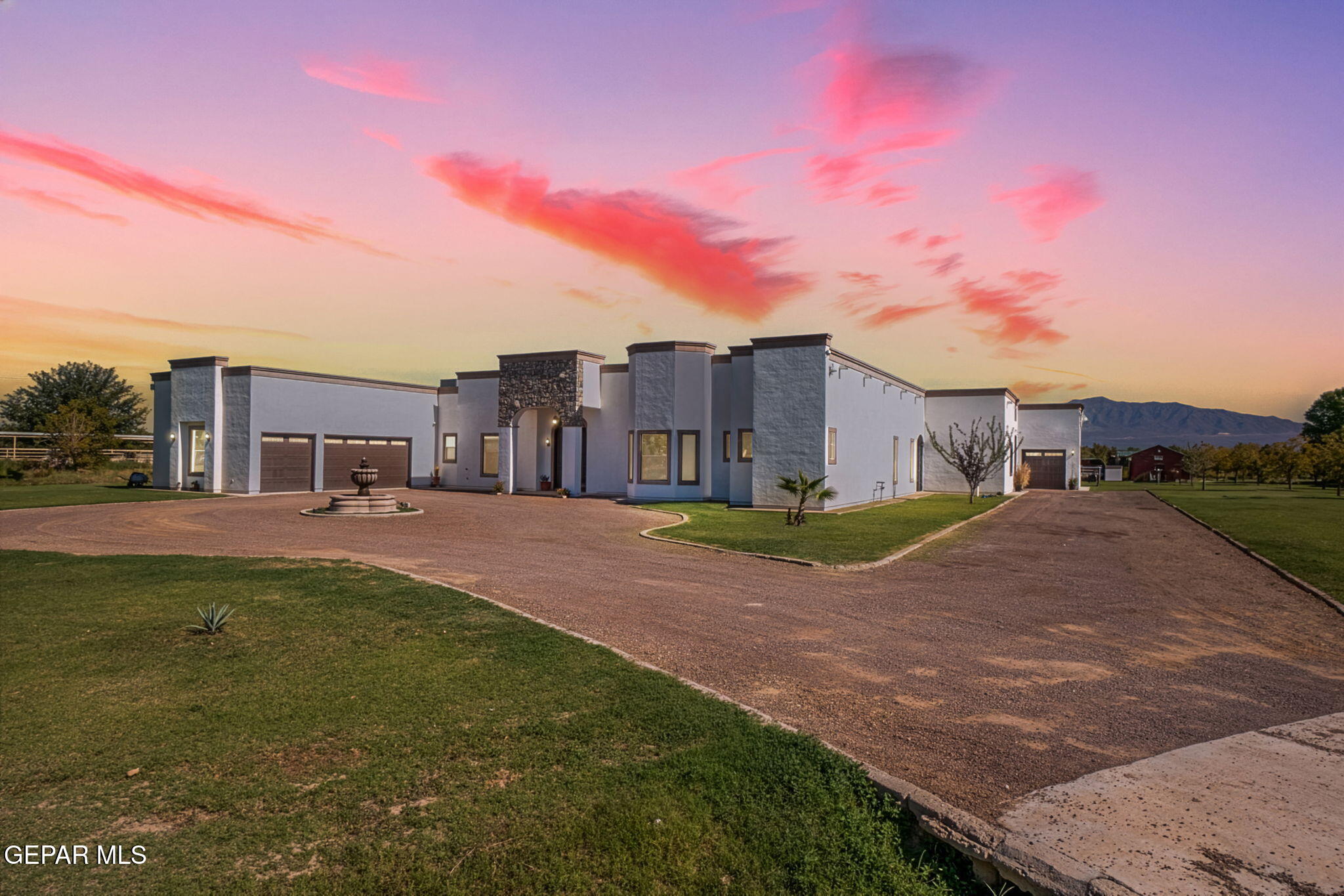 6750 Gato Road El Paso, TX 79932 - Photo 2 of 43 a view of a street with a building in the background