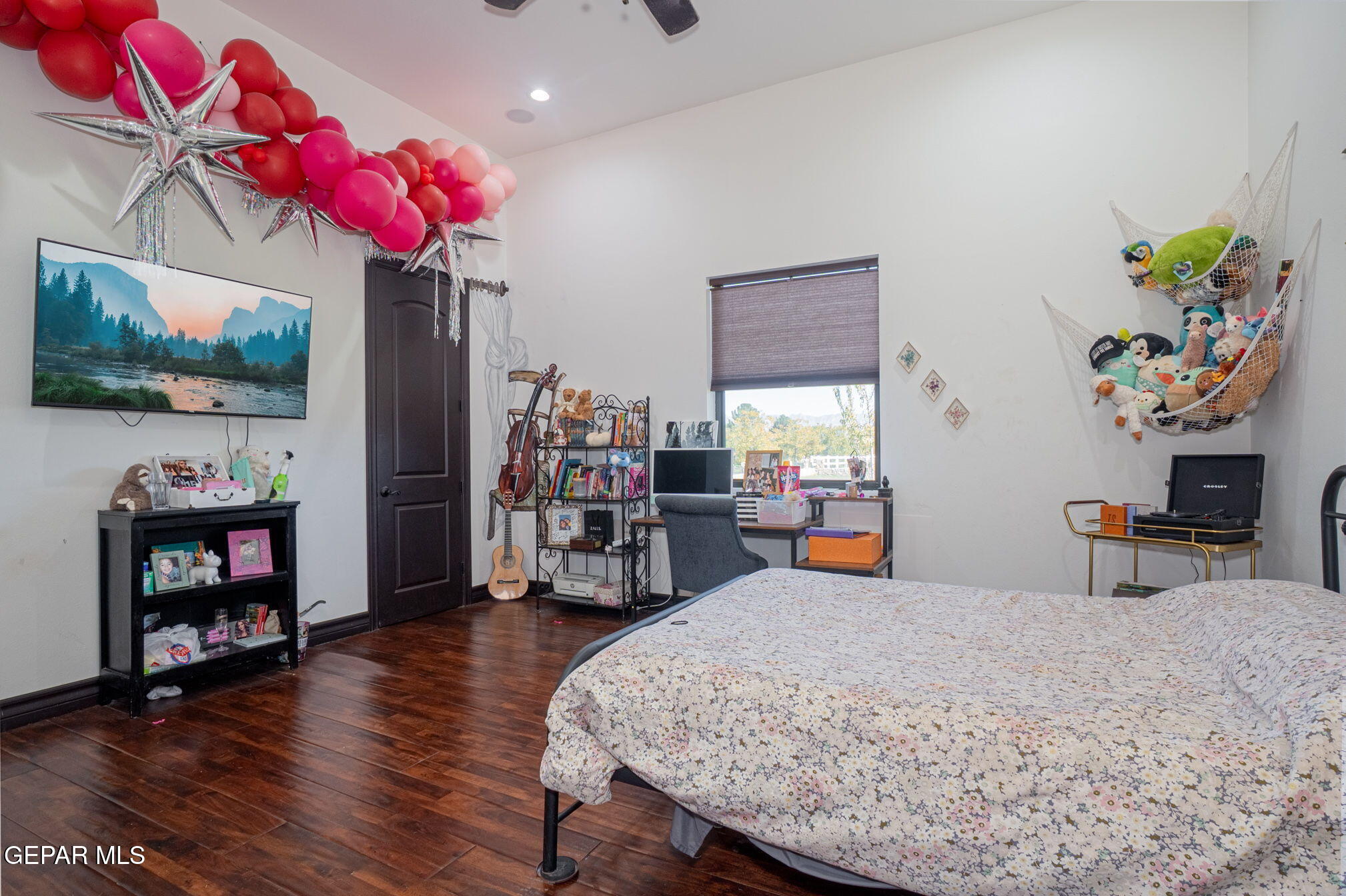 6750 Gato Road El Paso, TX 79932 - Photo 21 of 43 a bedroom with furniture and a flat screen tv