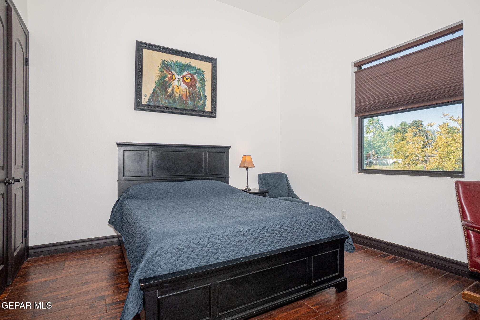 6750 Gato Road El Paso, TX 79932 - Photo 23 of 43 a bedroom with a bed and a wall painting