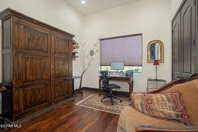 a bathroom with a sink a mirror and a toilet
