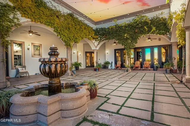 a view of a building with outdoor seating