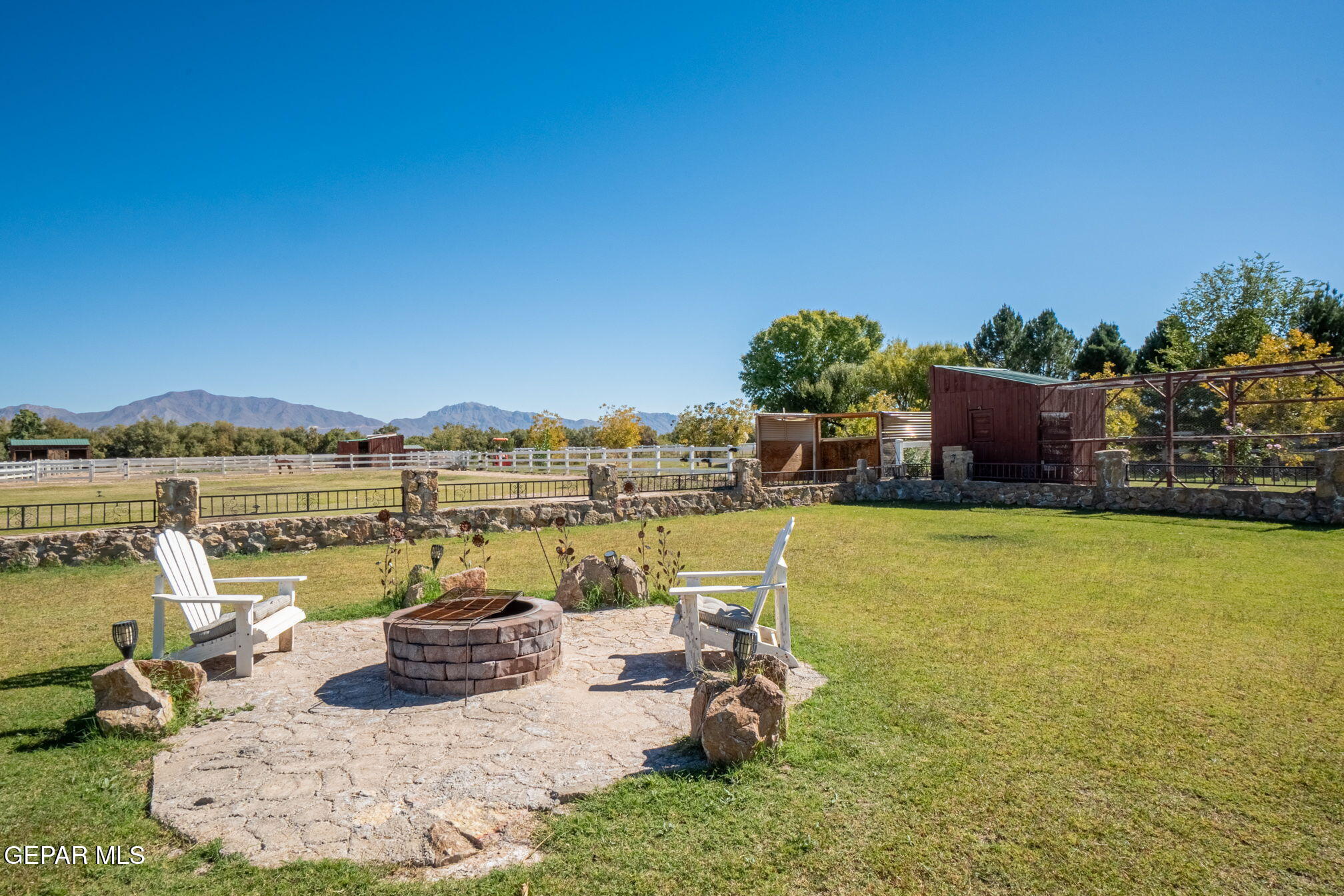 6750 Gato Road El Paso, TX 79932 - Photo 33 of 43 a view of a lake with couches chairs