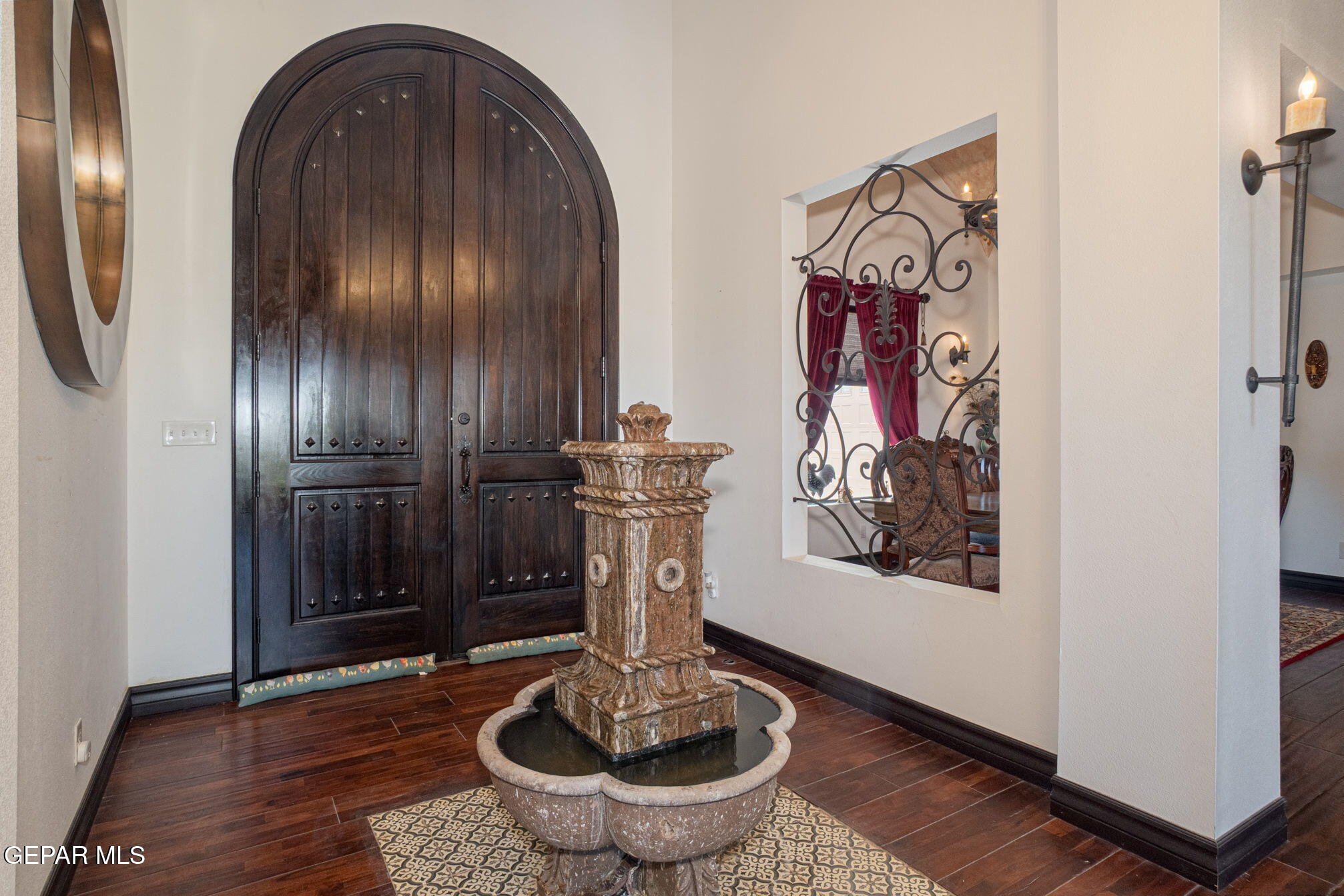 6750 Gato Road El Paso, TX 79932 - Photo 9 of 43 a view of entryway with furniture and wooden floor