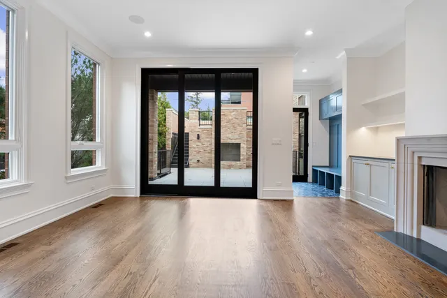 a view of a fireplace with stairs and a yard