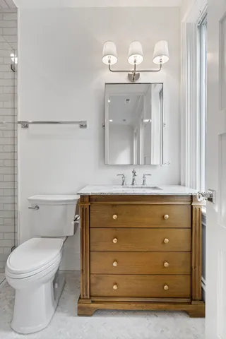 a view of an empty room with a fireplace