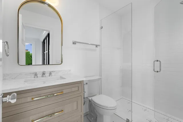 a bathroom with a sink and mirror