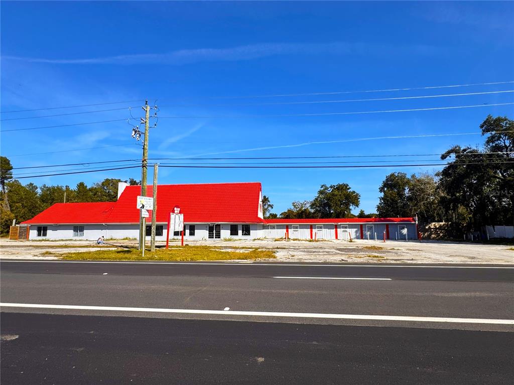 4795 Highway 1 Mims, FL 32754 - Photo 1 of 22 a view of a street with cars on road