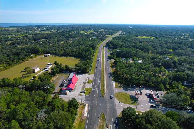 a view of swimming pool with a yard