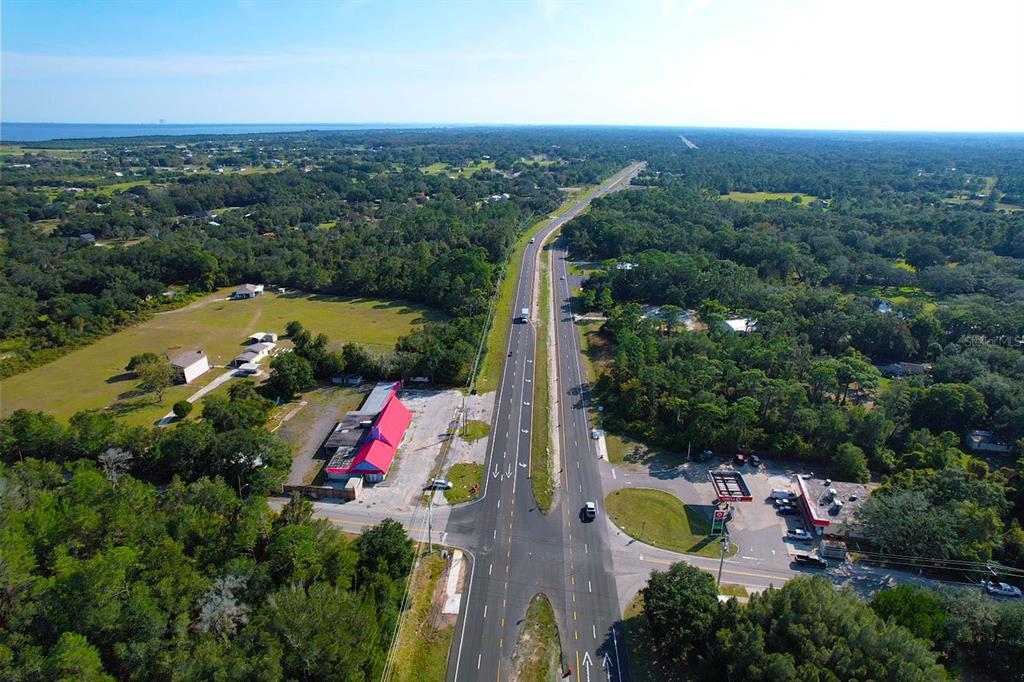 4795 Highway 1 Mims, FL 32754 - Photo 20 of 22 an aerial view of residential houses with outdoor space and swimming pool