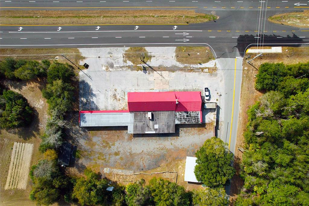 4795 Highway 1 Mims, FL 32754 - Photo 21 of 22 a view of swimming pool with a yard