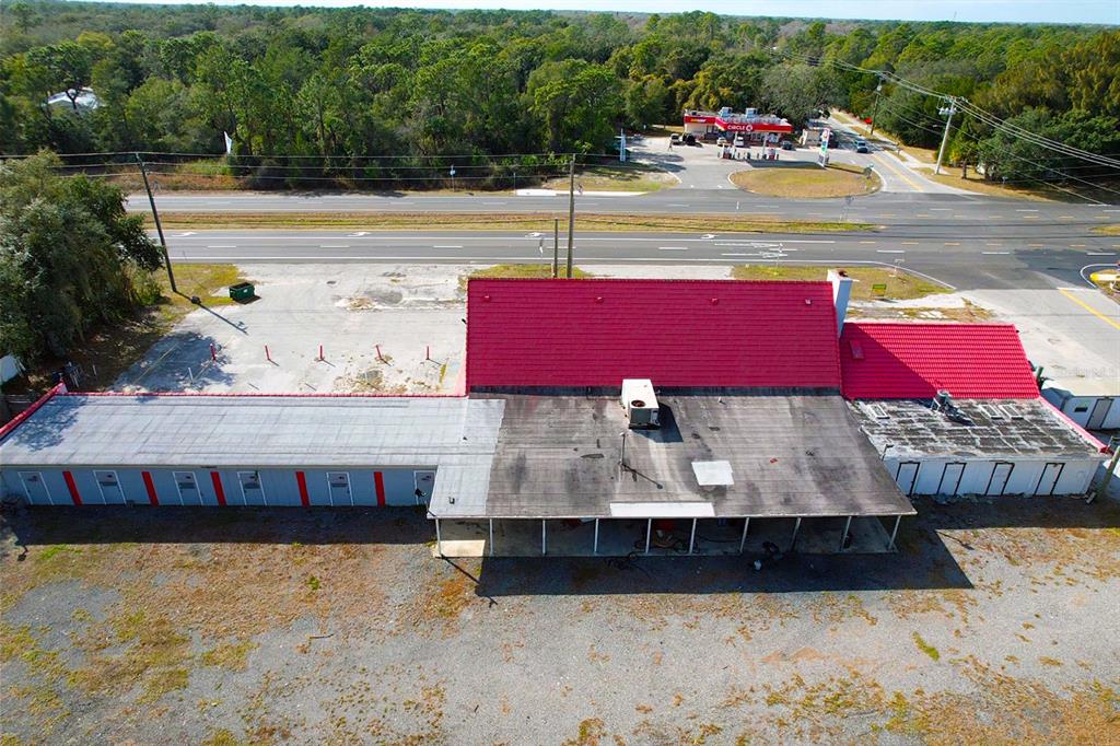4795 Highway 1 Mims, FL 32754 - Photo 5 of 22 a view of a swimming pool with a bench