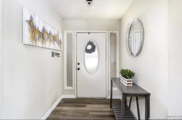 a front view of a house with garden equipment