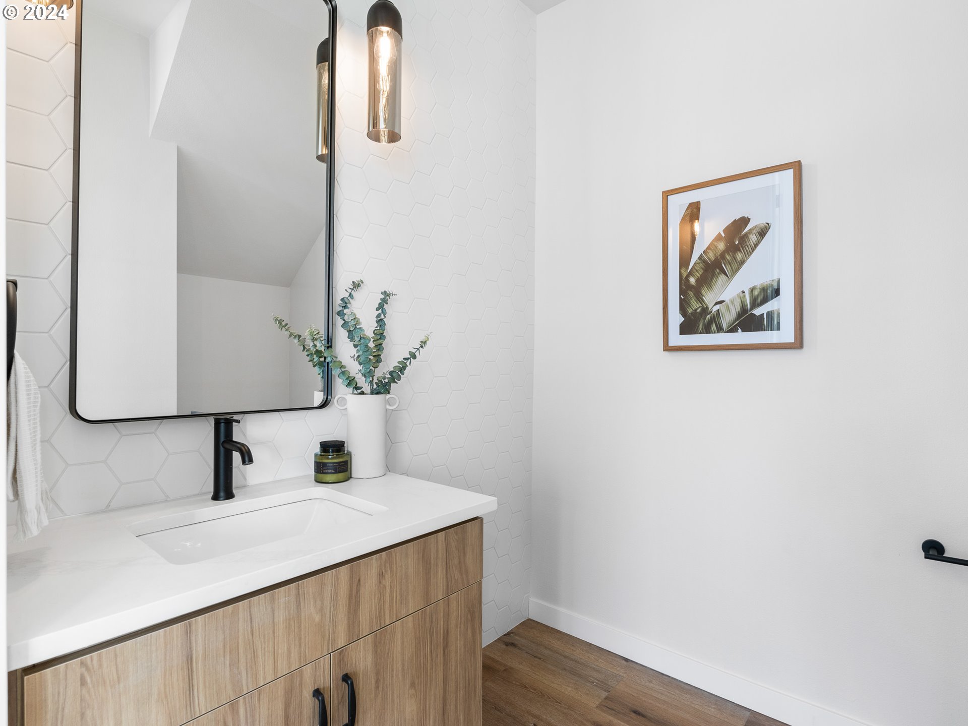 457 Northeast 74th Avenue, Unit 1 Portland, OR 97213 - Photo 12 of 26 a bathroom with a sink and a mirror