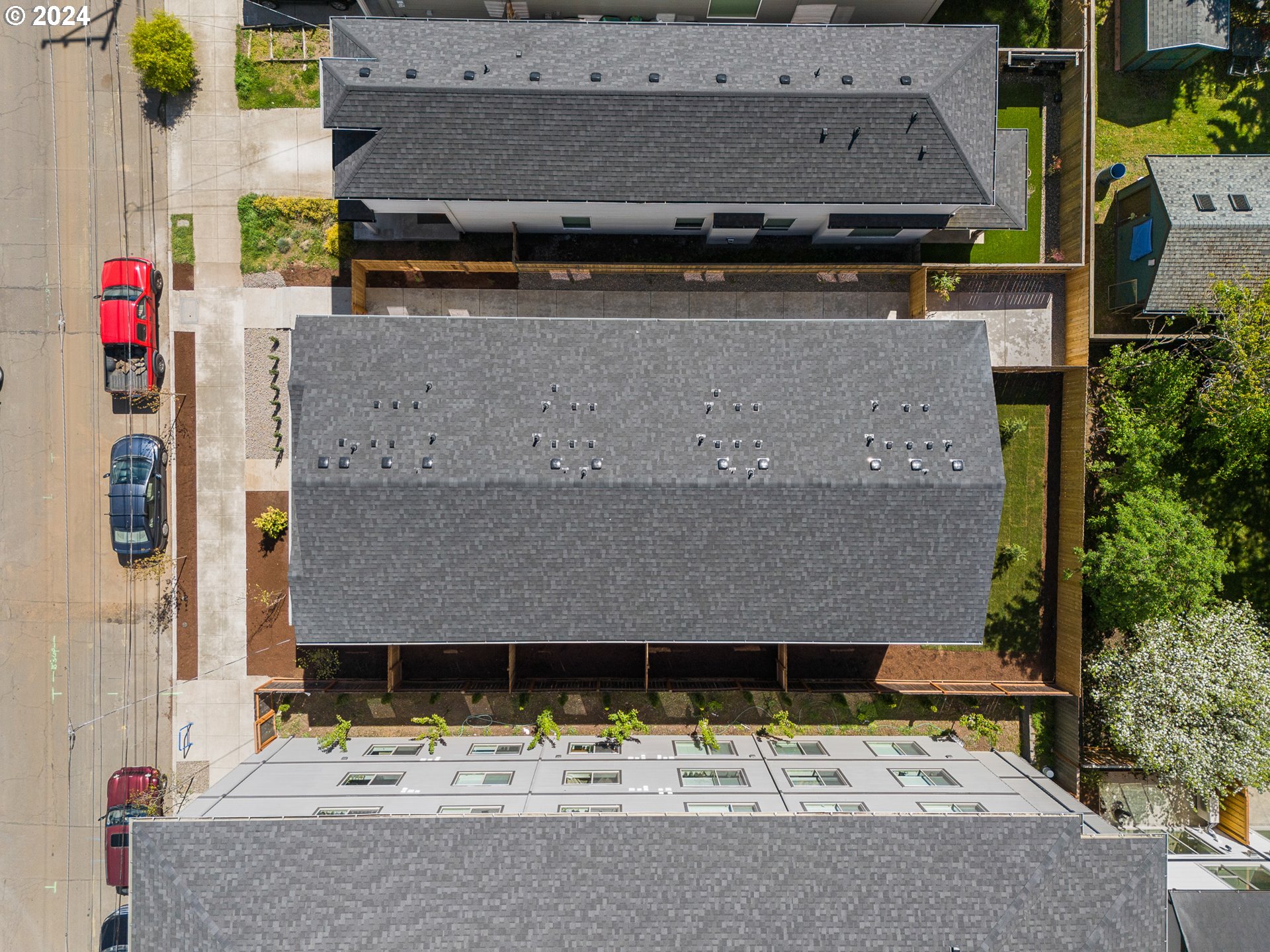 457 Northeast 74th Avenue, Unit 1 Portland, OR 97213 - Photo 24 of 26 an aerial view of a house with a swimming pool