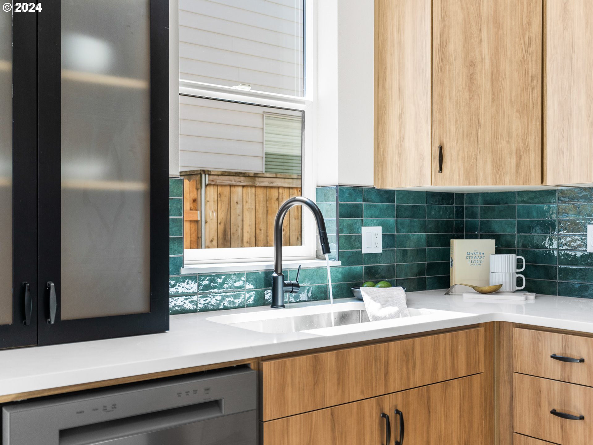 457 Northeast 74th Avenue, Unit 1 Portland, OR 97213 - Photo 7 of 26 a kitchen with a sink and a large window