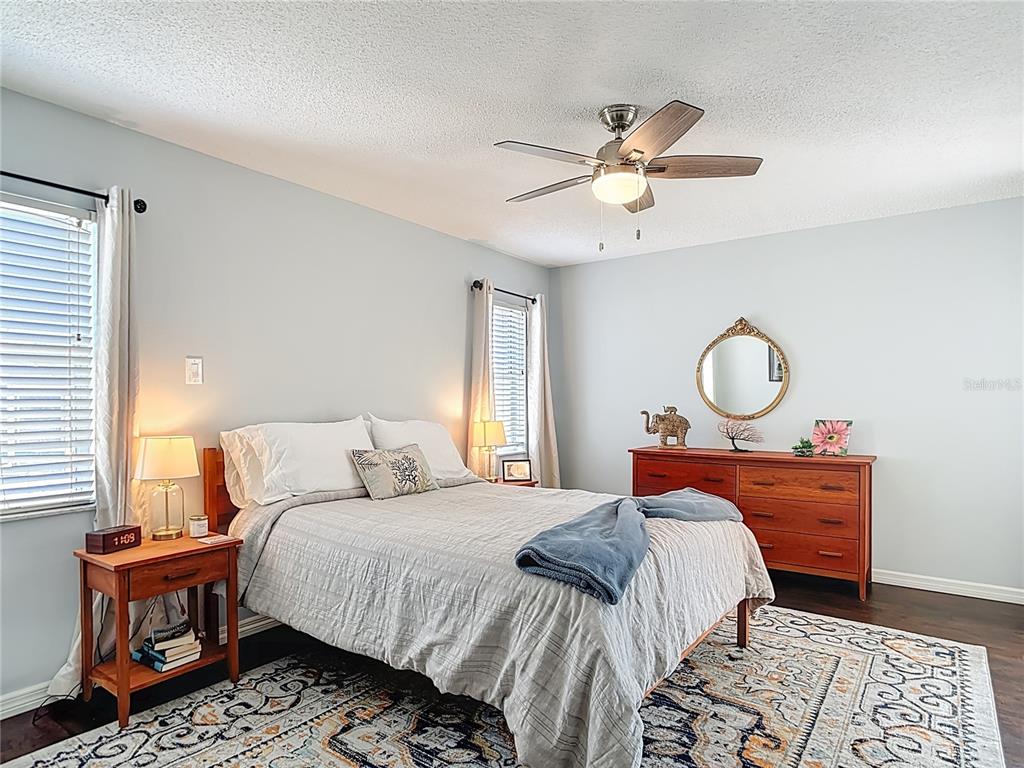 10253 Winstead Avenue Englewood, FL 34224 - Photo 12 of 46 a bedroom with a bed and window