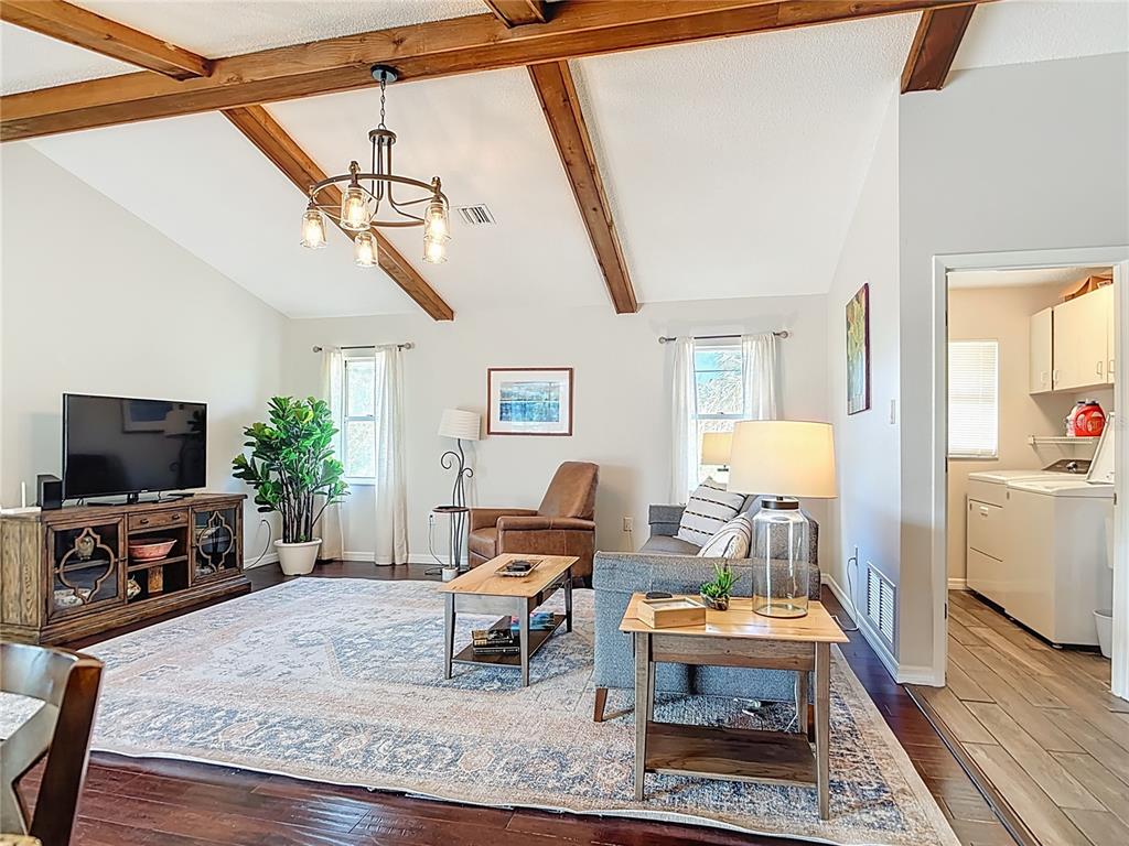 10253 Winstead Avenue Englewood, FL 34224 - Photo 31 of 46 a living room with furniture and a flat screen tv