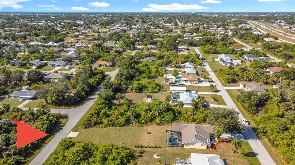 10253 Winstead Avenue Englewood, FL 34224 - Photo 43 of 46 an aerial view of residential houses with outdoor space