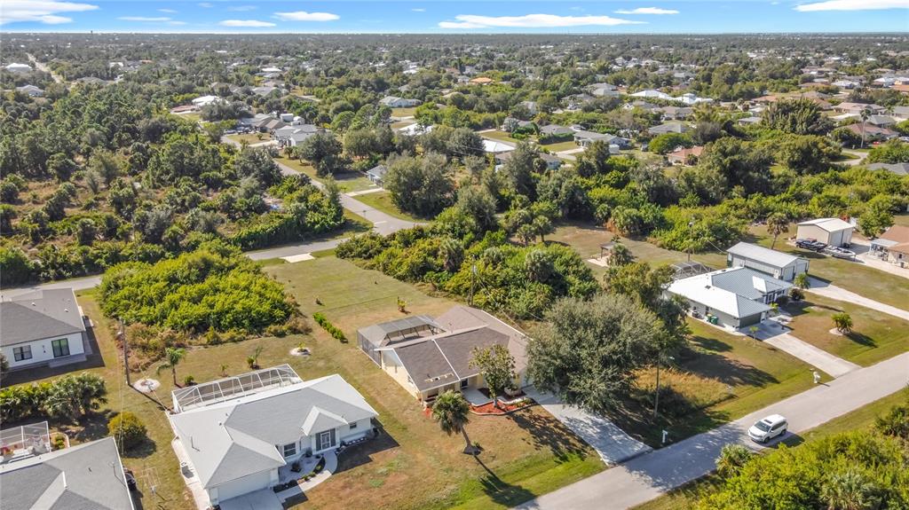 10253 Winstead Avenue Englewood, FL 34224 - Photo 45 of 46 an aerial view of residential houses with outdoor space