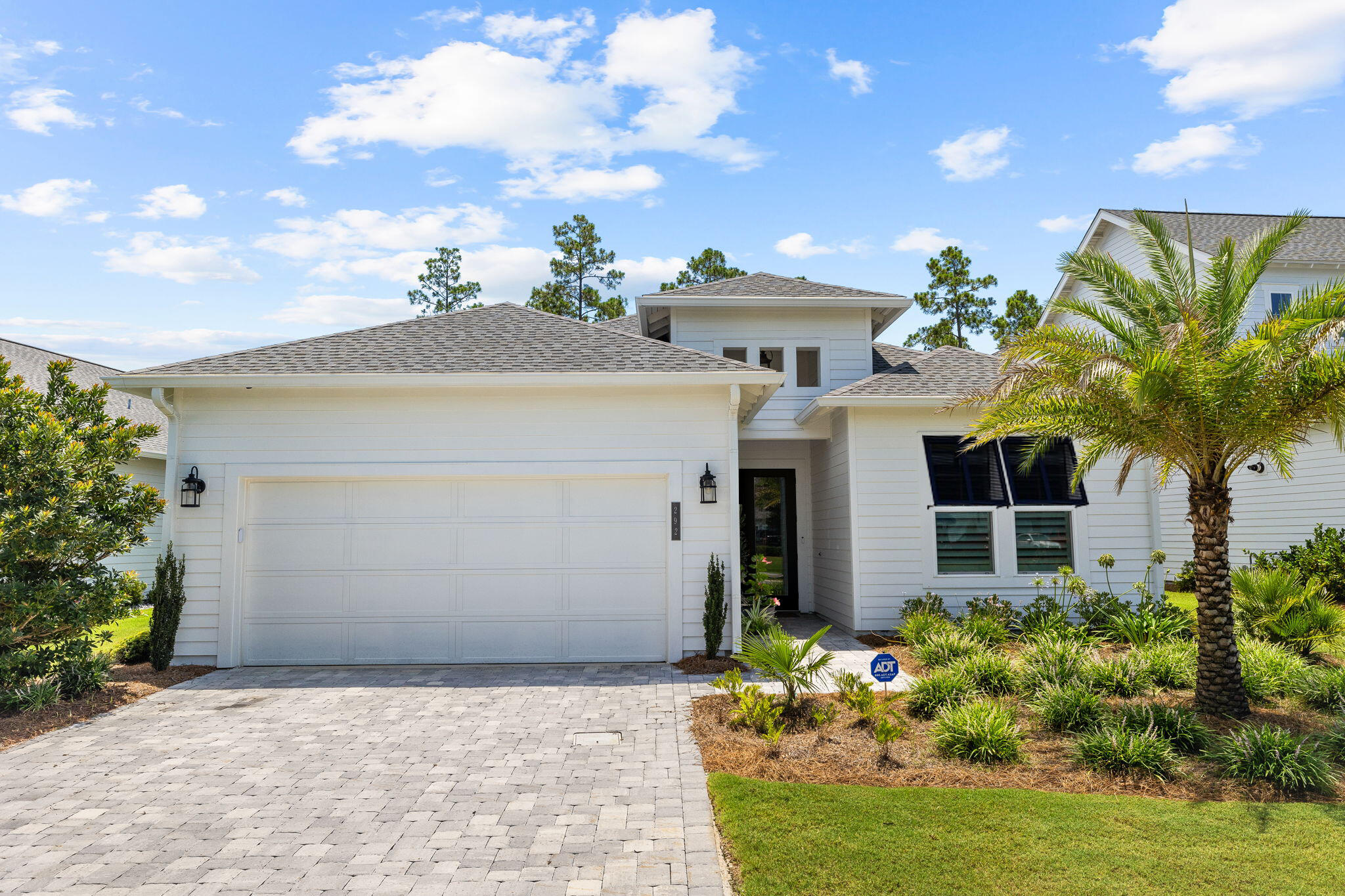 292 Naturewalk Blvd Inlet Beach Inlet Beach, FL 32461 - Photo 2 of 2 a front view of a house with a yard