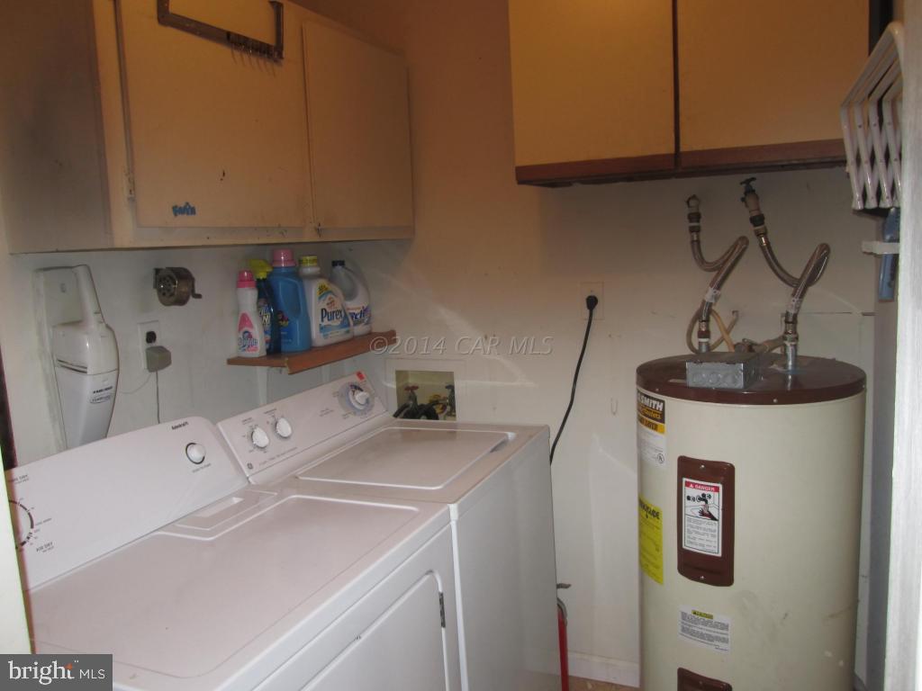 165 Windjammer Road Berlin, MD 21811 - Photo 24 of 26 a utility room with dryer and washer