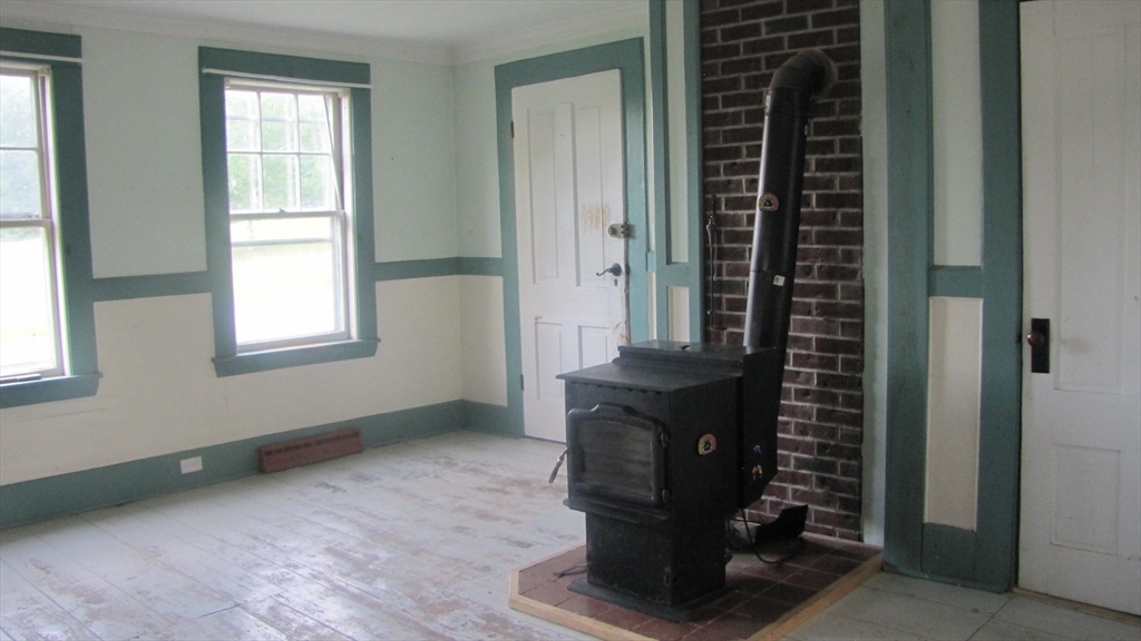 67 Luke Road Ashby, MA 01431 - Photo 8 of 30 an empty room with windows