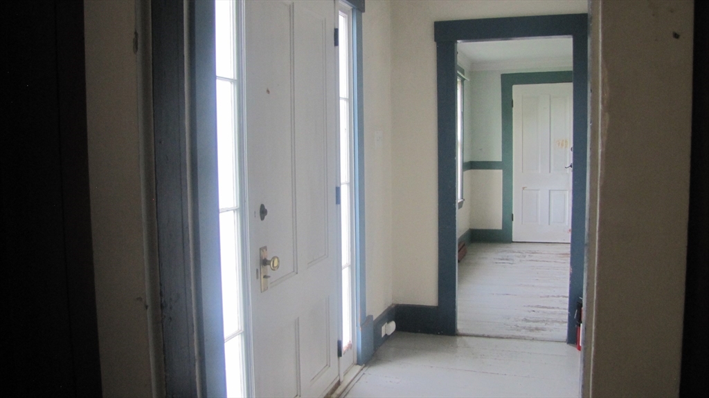 67 Luke Road Ashby, MA 01431 - Photo 10 of 30 a view of a bathroom from a hallway