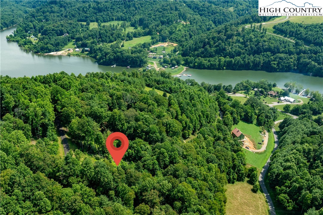 Lot 31 Lake Ridge Butler, TN 37640 - Photo 25 of 31 an aerial view of a house with a yard and lake view