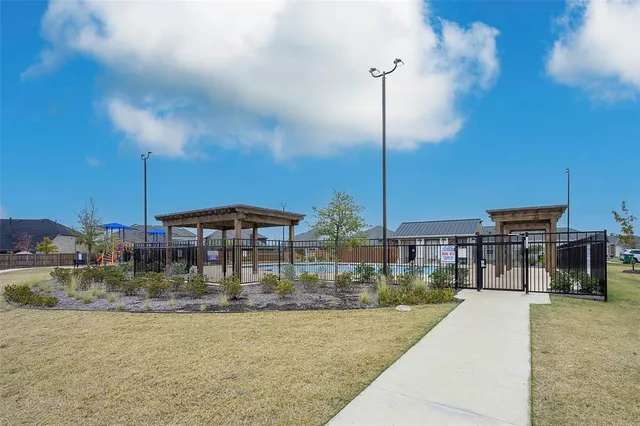 a swimming pool view with a outdoor space