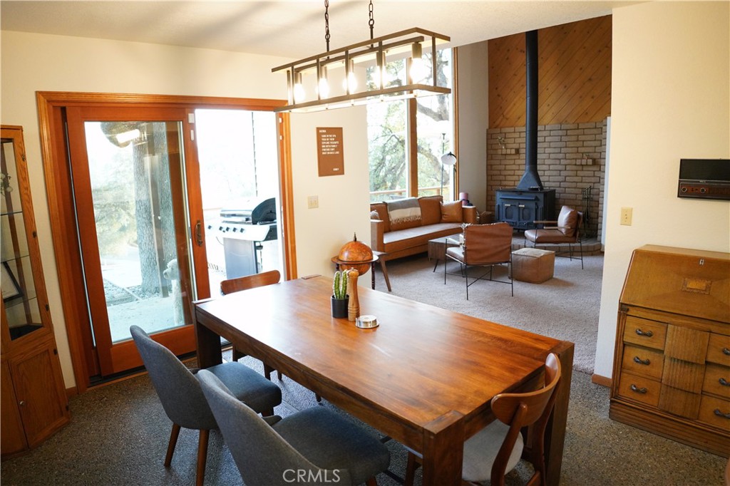40659 Indian Springs Road Oakhurst, CA 93644 - Photo 14 of 28 a dining room with furniture and window
