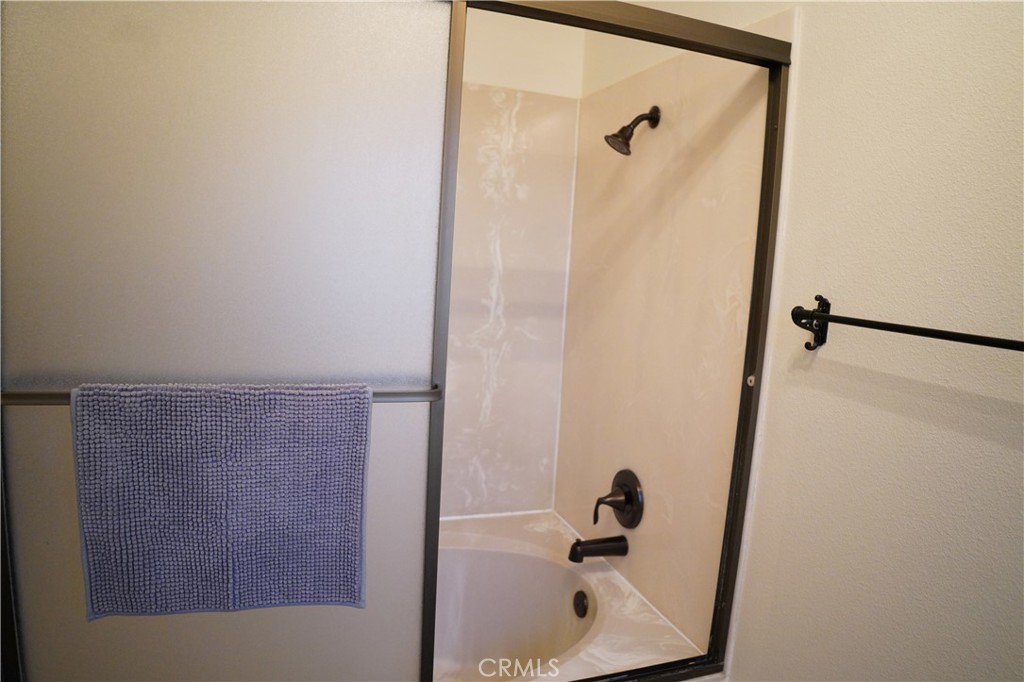 40659 Indian Springs Road Oakhurst, CA 93644 - Photo 18 of 28 a bathroom with a shower