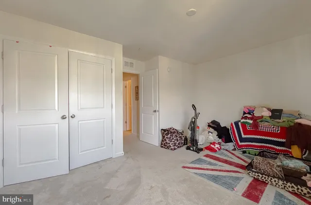 a room with furniture and a flat screen tv