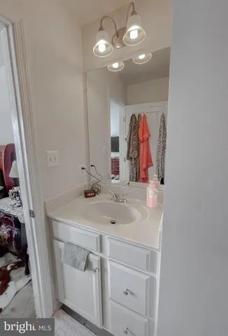 a view of an apartment building with a yard