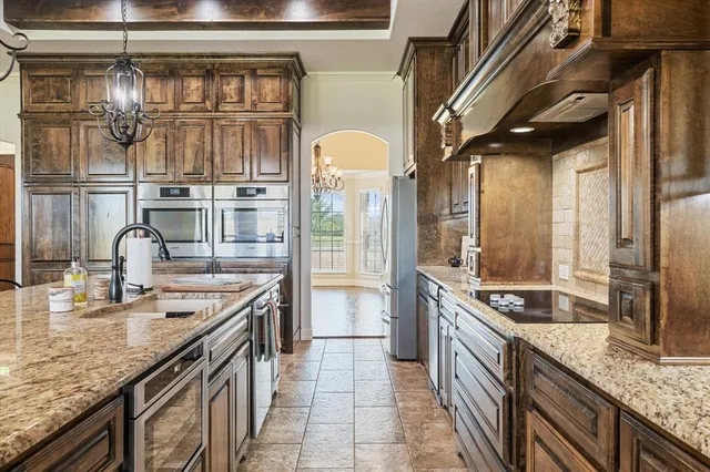 a view of a kitchen with a sink cabinets and a window