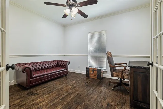 a bathroom with a granite countertop toilet and a sink