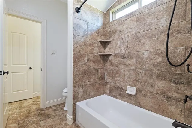 a outdoor space with patio furniture and a fireplace