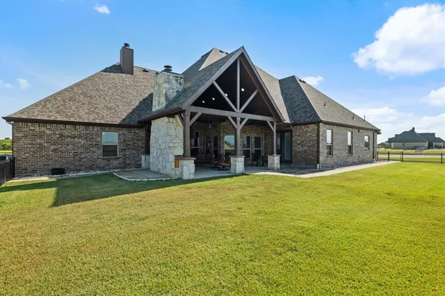 a view of a lake with a house