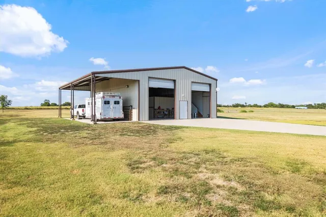 a kitchen with lots of counter top space and stainless steel appliances