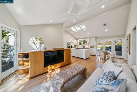a view of kitchen with sink and wooden floor