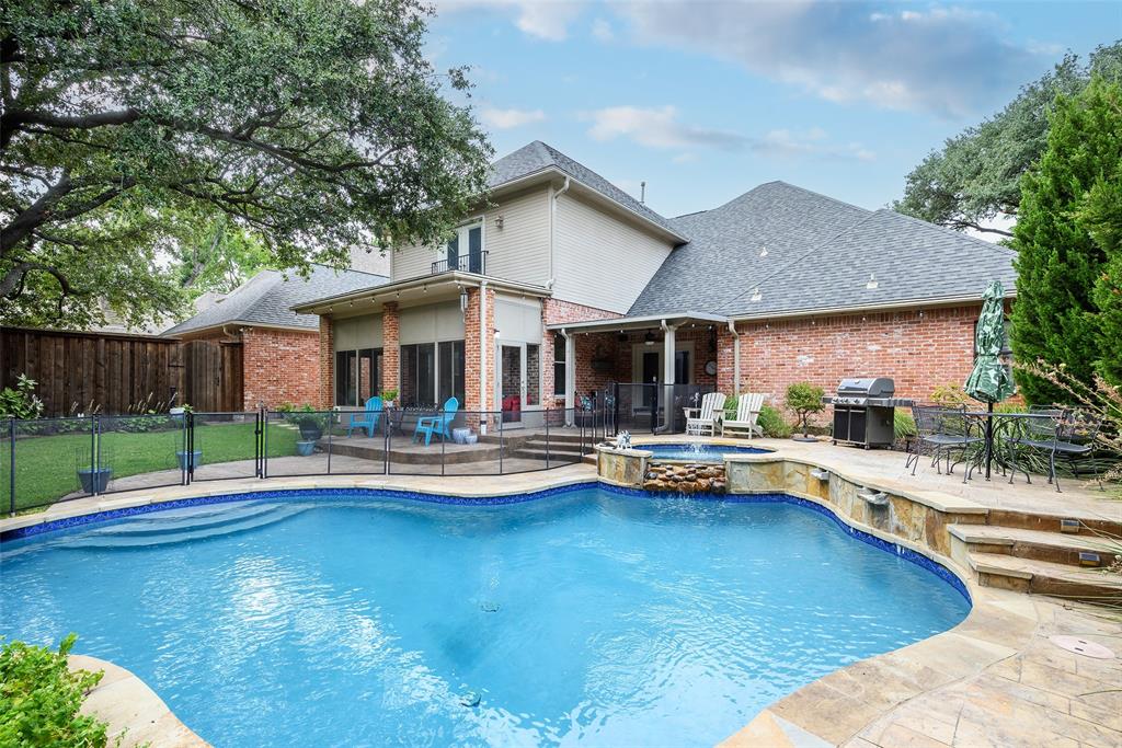 6822 Meadow Road Dallas, TX 75230 - Photo 32 of 35 Total inclosed backyard, driveway with electric gate, storage shed and beautiful inviting backyard.