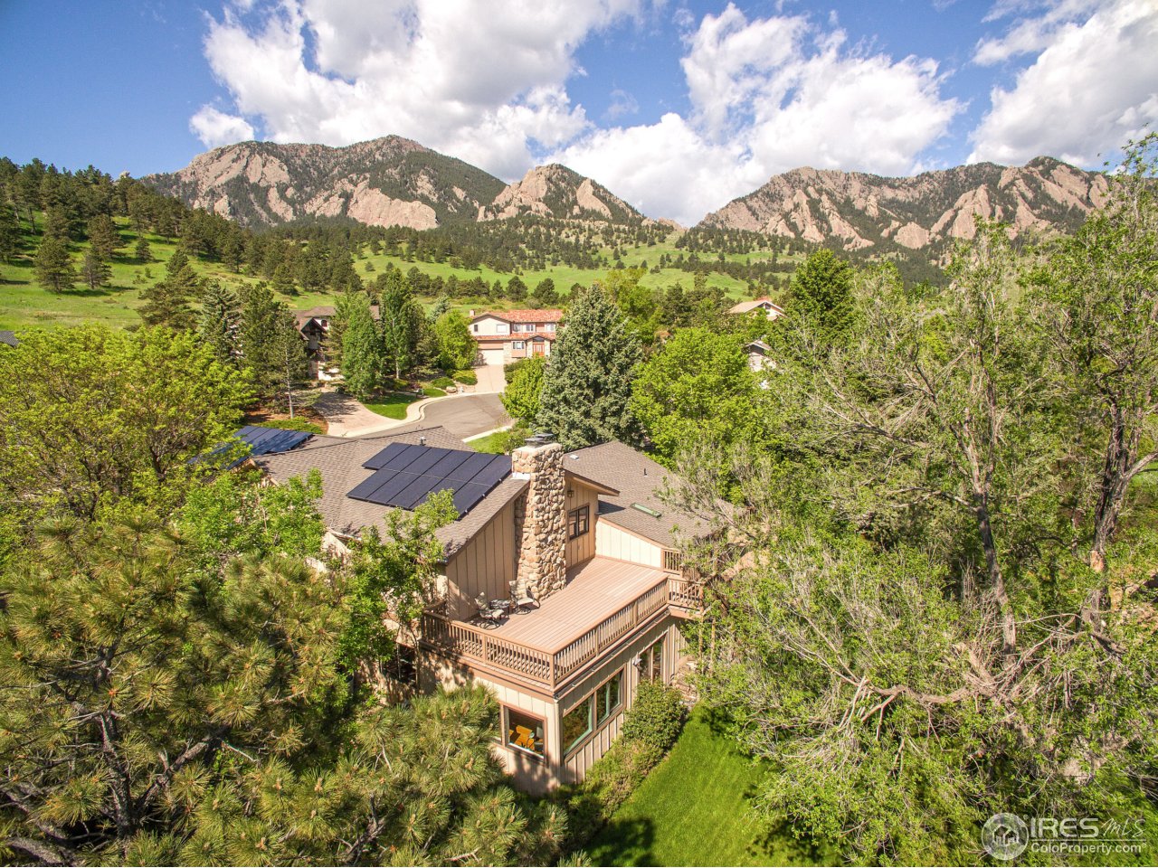 a view of a house with a mountain