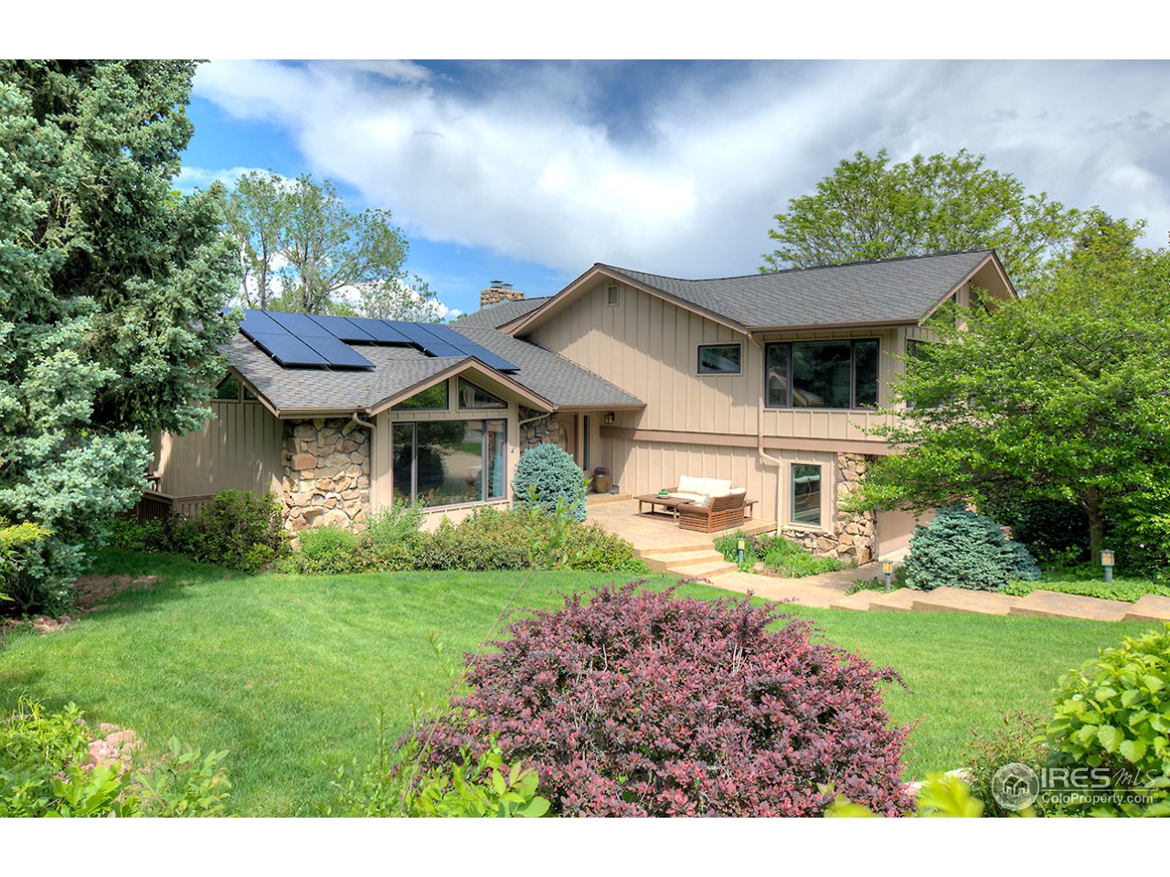 1715 View Point Road Boulder, CO 80305 - Photo 2 of 33 a front view of a house with a yard
