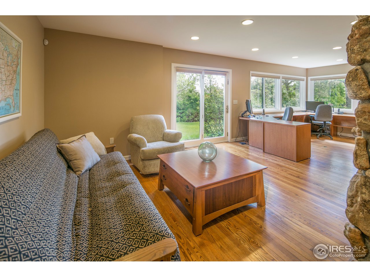 1715 View Point Road Boulder, CO 80305 - Photo 22 of 33 a living room with furniture and a large window