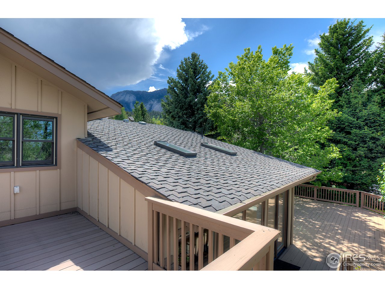 1715 View Point Road Boulder, CO 80305 - Photo 28 of 33 a view of backyard with roof deck and wooden floor