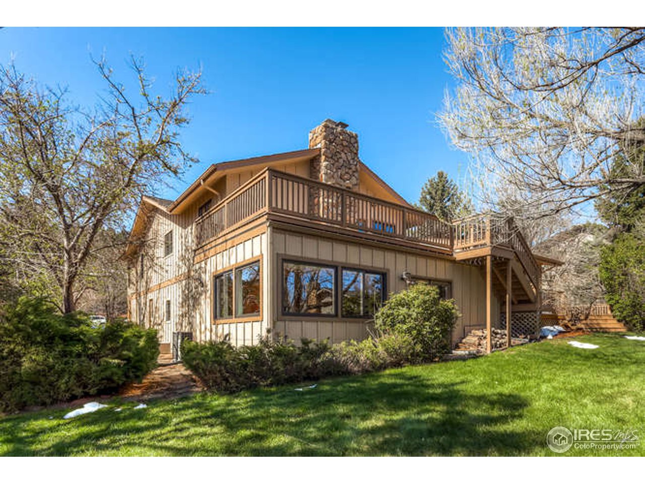 1715 View Point Road Boulder, CO 80305 - Photo 29 of 33 a front view of a house with a yard