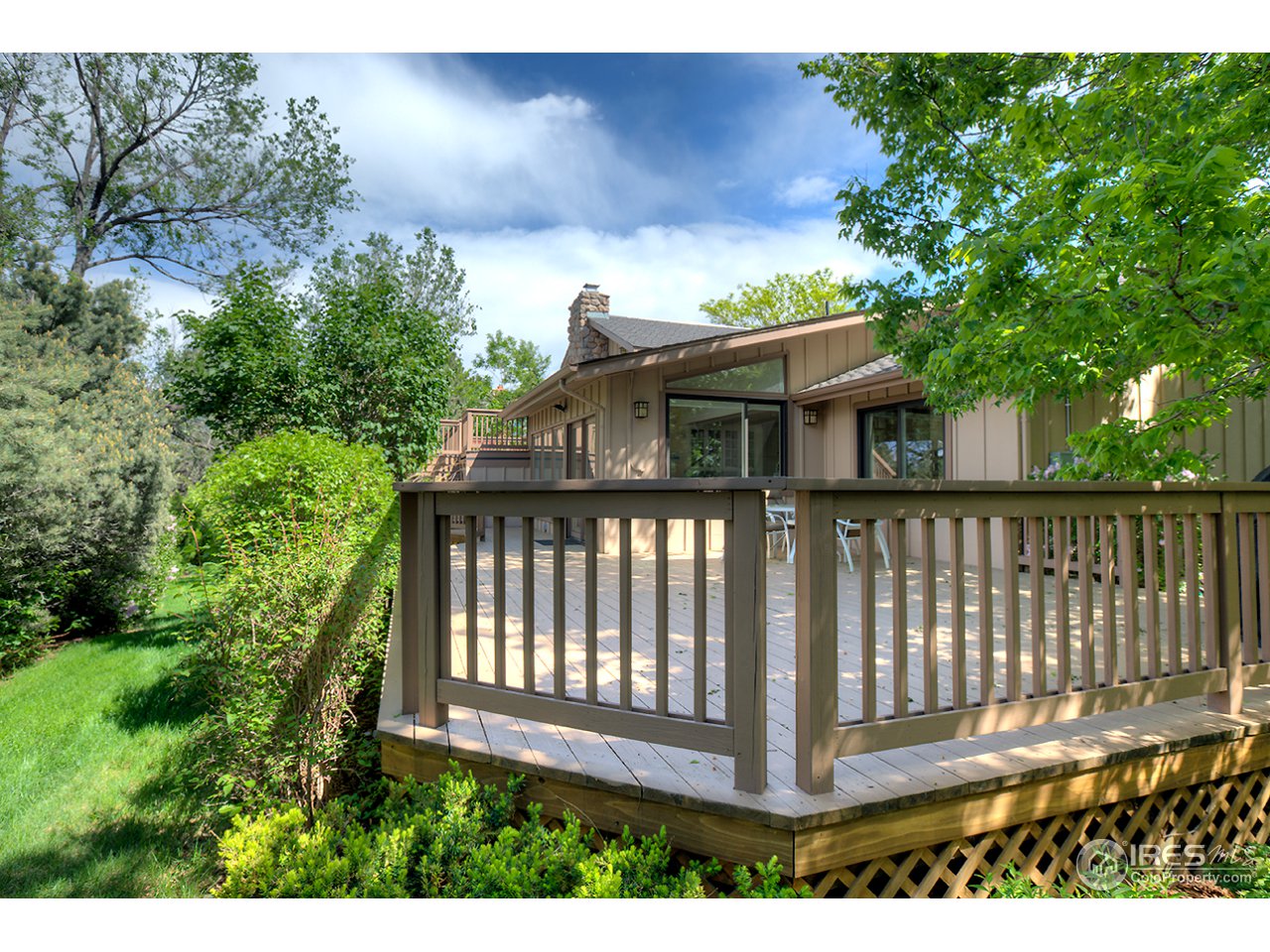 1715 View Point Road Boulder, CO 80305 - Photo 3 of 33 a front view of a house with a porch