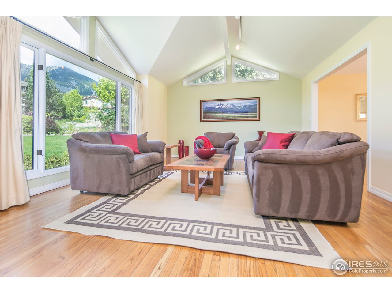 1715 View Point Road Boulder, CO 80305 - Photo 8 of 33 a living room with furniture and a rug