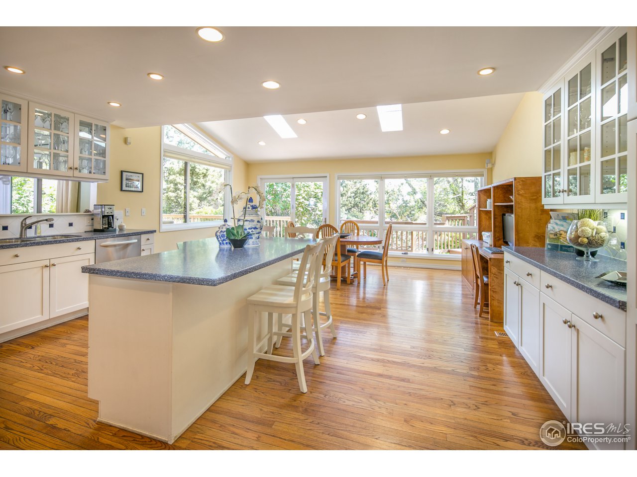 1715 View Point Road Boulder, CO 80305 - Photo 10 of 33 a kitchen with stainless steel appliances granite countertop a stove and cabinets