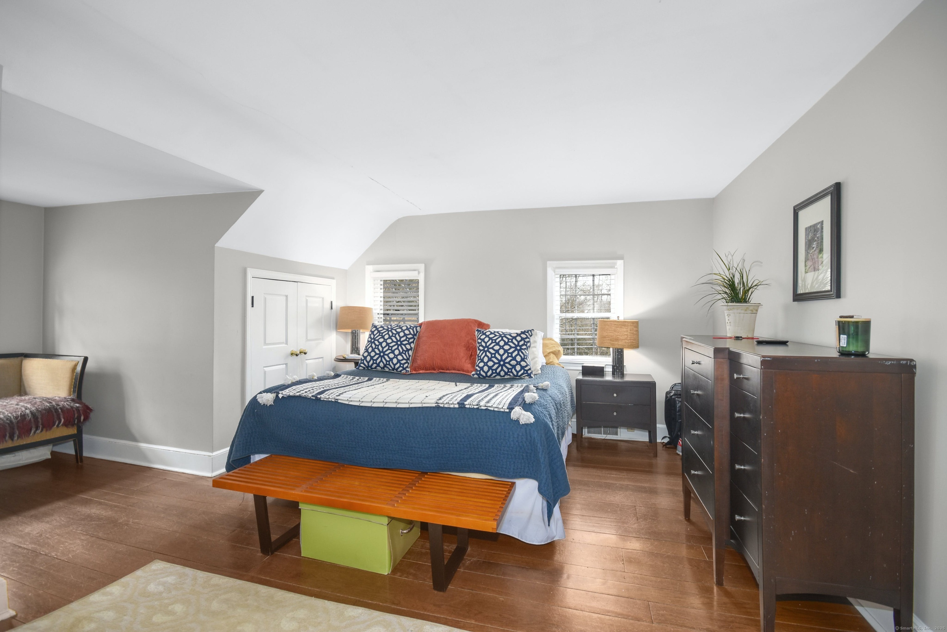 24 Cartbridge Road Weston, CT 06883 - Photo 18 of 27 The Upper Level ensuite Primary Bedroom has a walk-in closet as well as two additional closets, and a newly renovated full bathroom.