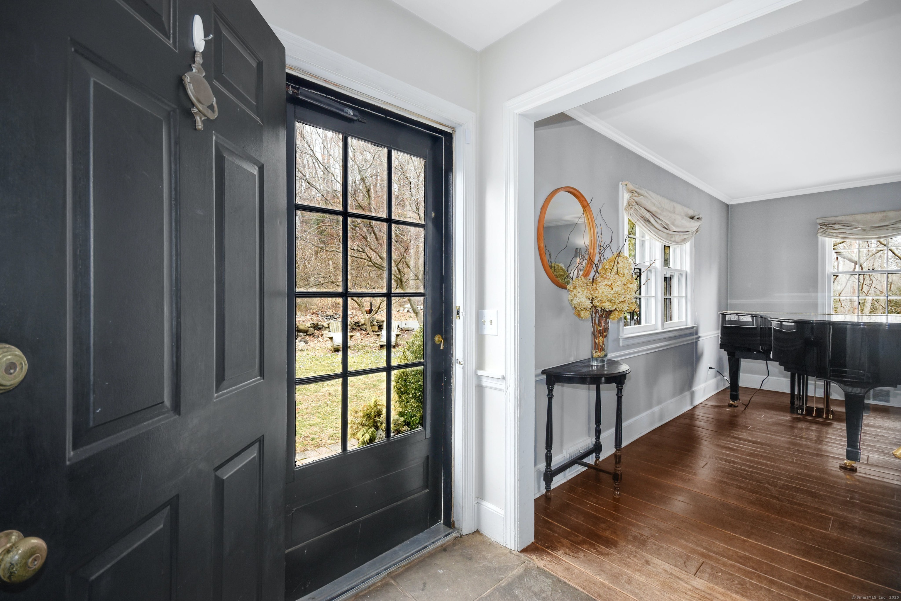 24 Cartbridge Road Weston, CT 06883 - Photo 4 of 27 Foyer looking towards the expansive Living Room.